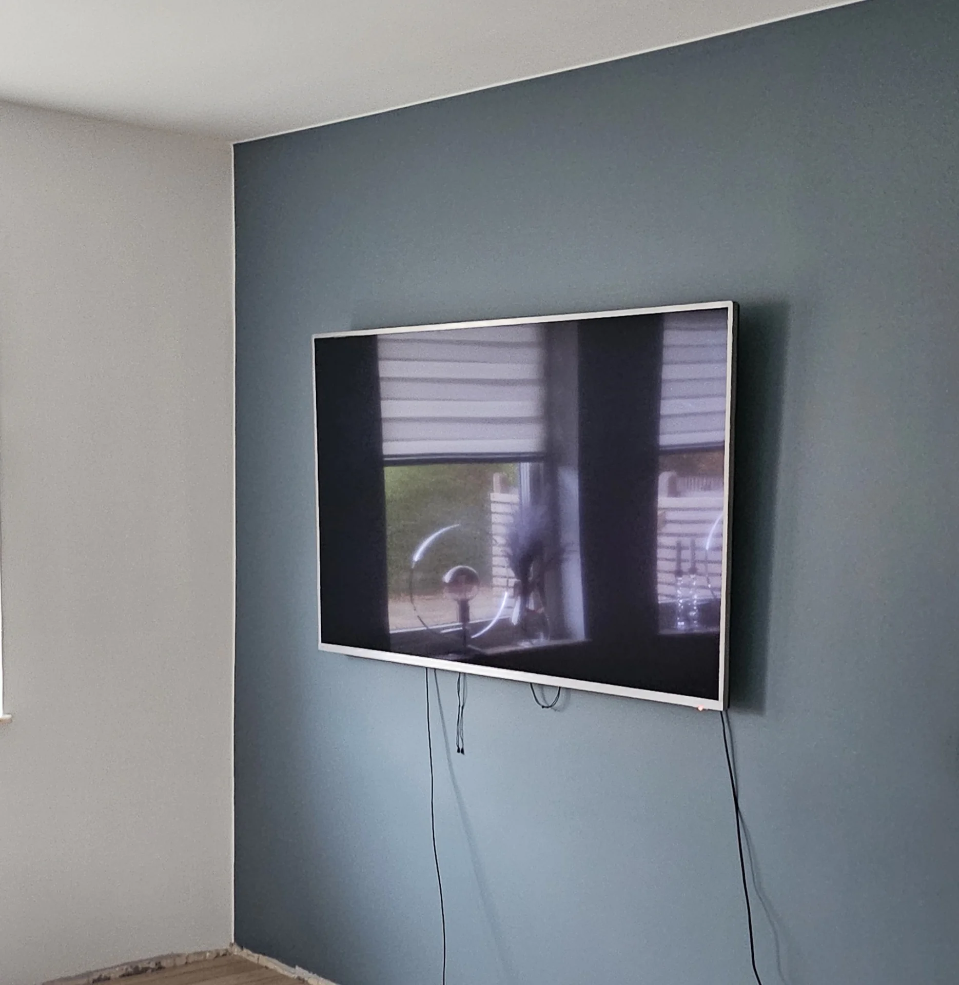 Invändig målning av vardagsrum utförd av Lundströms Färg & Design.